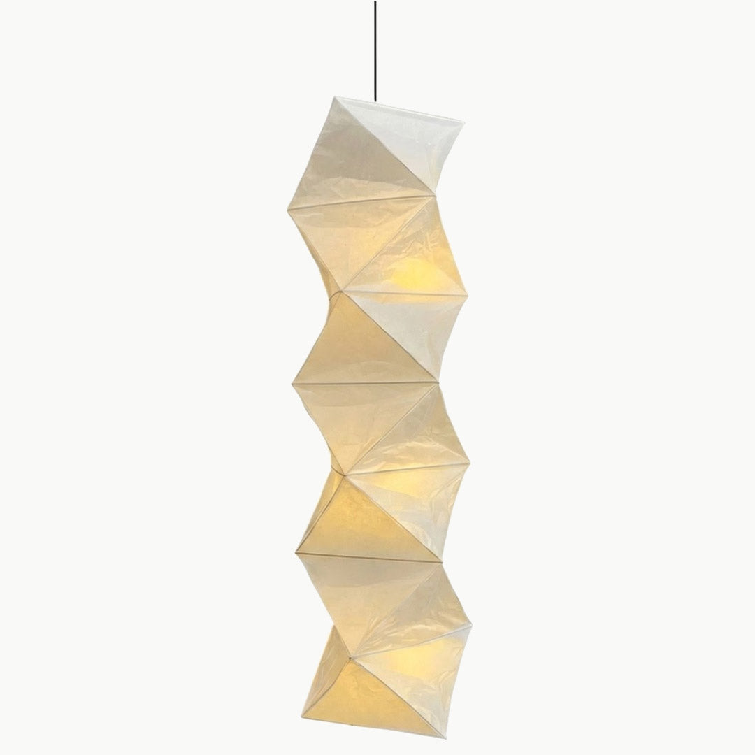 Large Akari L8 style vertical washi paper pendant light, 63 inches tall with accordion folds, emitting a warm ethereal glow.