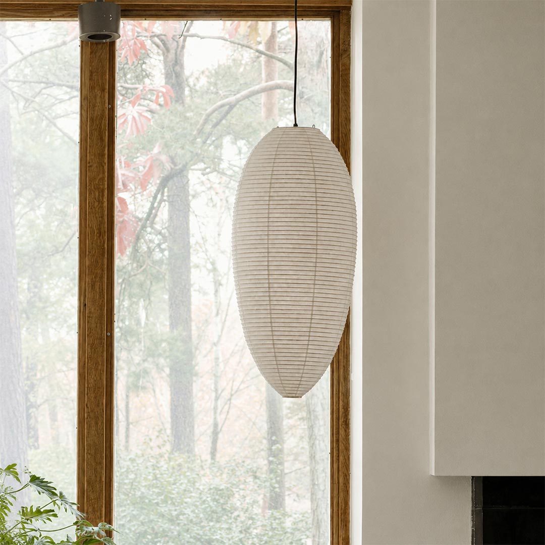 Organic modern dining room with an oval handcrafted Washi paper ceiling pendant lamp - stuberlighting
