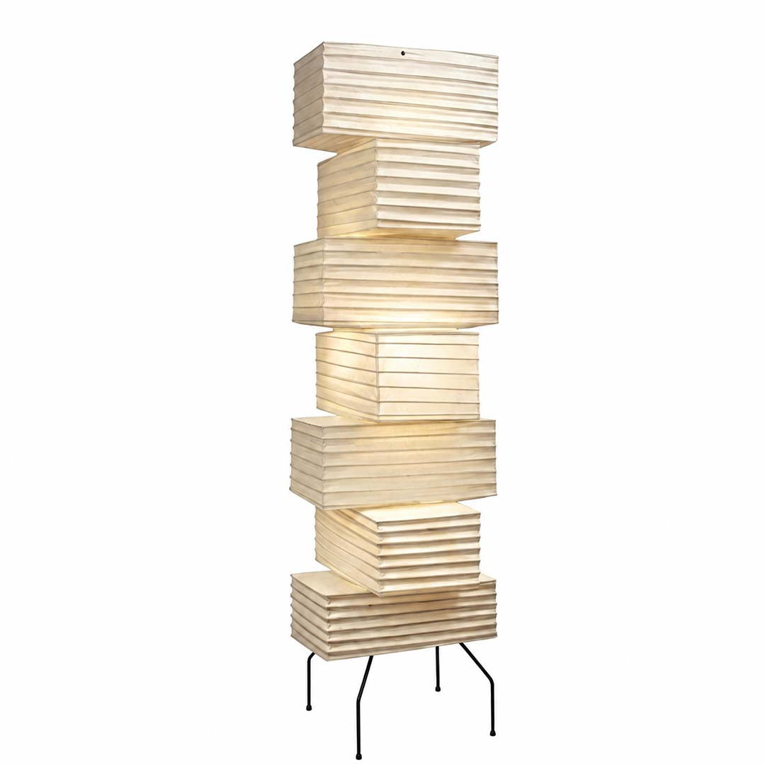 Close-up of glowing Akari UF4-L10 paper floor lamp on white background - stuberlighting
