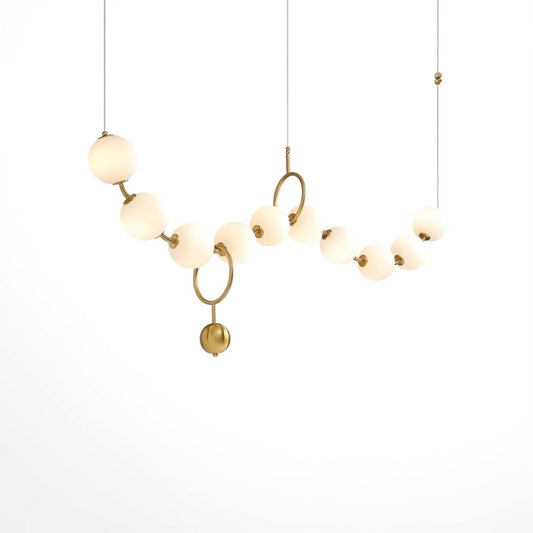 Cascadia linear horizontal chandelier 10-light brass arc pearl globes white background