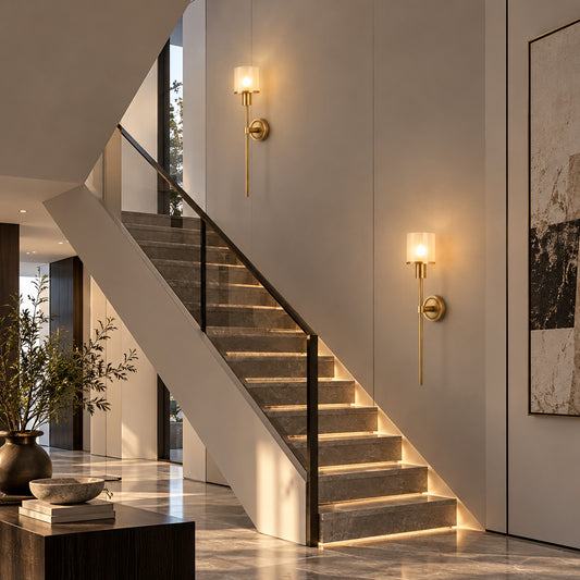 Cero wall sconce at the foot of a staircase