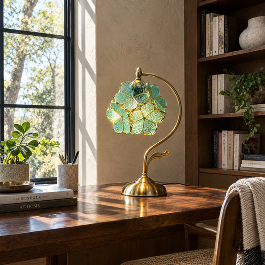 Foglia glass table lamp adding a nature-inspired accent to a home office desk