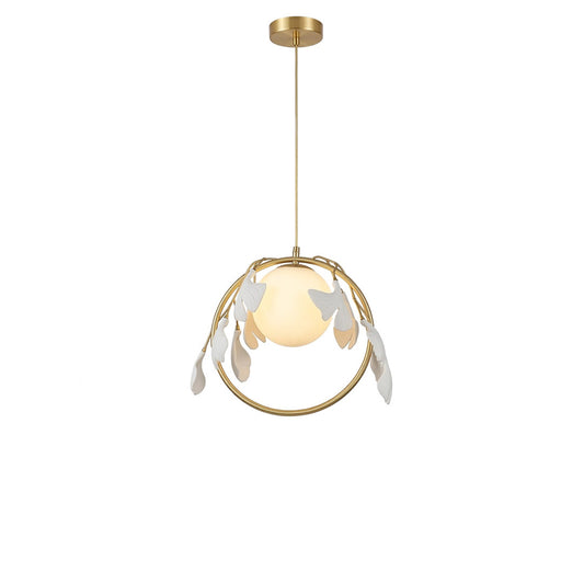 Ginkgo botanical pendant Model A dense cluster hand cast porcelain leaves brass halo frosted glass orb white background