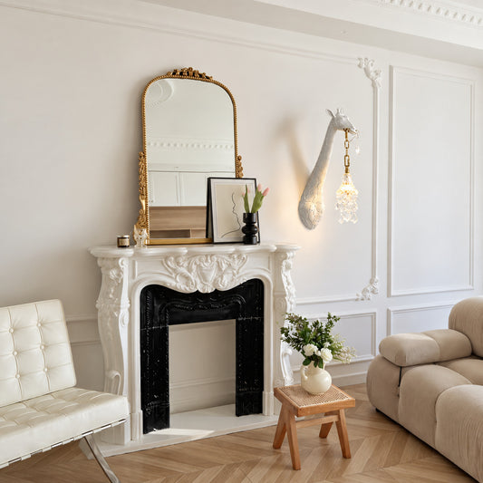 Giraffe crystal wall sconce as a playful sculptural accent on a living room wall