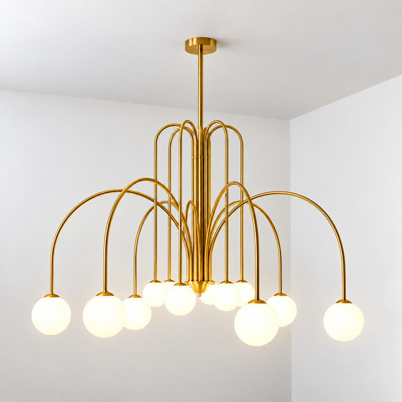 Twelve-head copper Gran Finale glass chandelier filling a grand entryway with a warm cluster