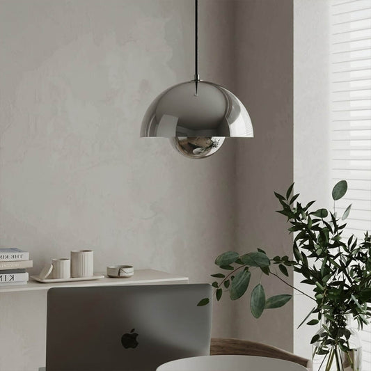 Halo pendant lights three in a row above kitchen island mid century modern interior