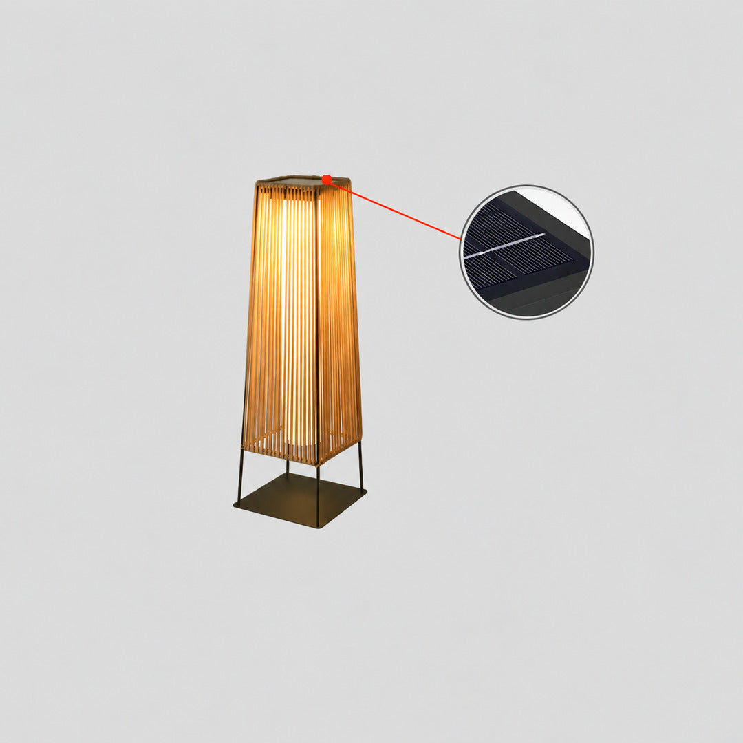 Large 35.4-inch solar Intreccio outdoor post light standing beside a patio seating area