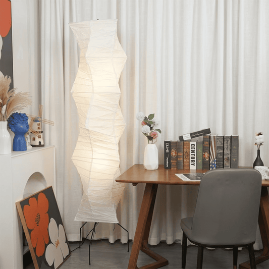 Washi paper floor lamp UF4-33N illuminating a minimalist living room.