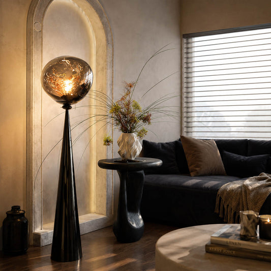 Lava sculptural floor lamp modern living room beside sofa gold metallic molten statement ambient American home lifestyle interior