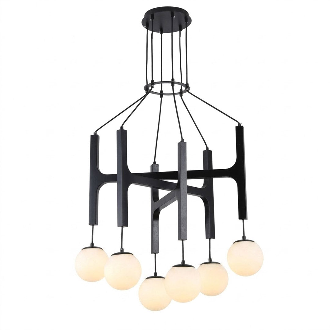 Orbit walnut orb chandelier above dining table warm frosted globe glow organic modern interior