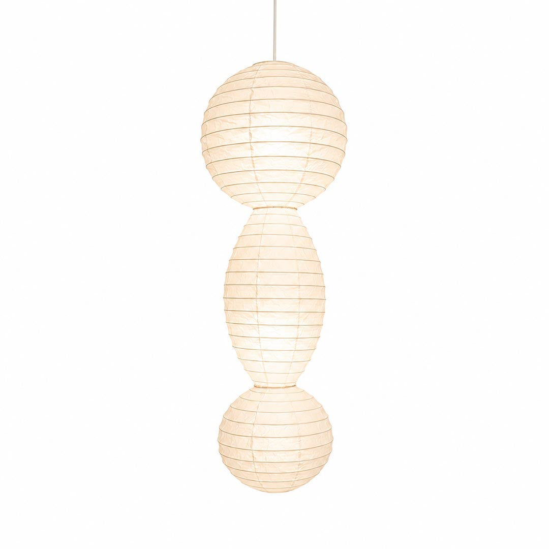 Studio portrait of the warmly illuminated 3-sphere Ori Lantern Series Pendant Light against a white backdrop by Stuber Lighting.