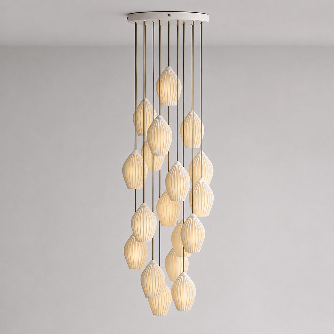 Piega pendant light 18 light cluster chandelier bone china ceramic ribbed pleated boho modern grand dining room hospitality lobby double height dramatic statement sculptural hardwired white background