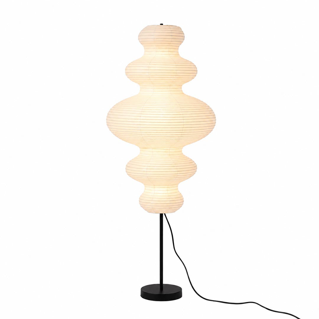 Handcrafted Chigiri Washi paper tower floor lamp with hand-torn mulberry paper texture and matte black base.