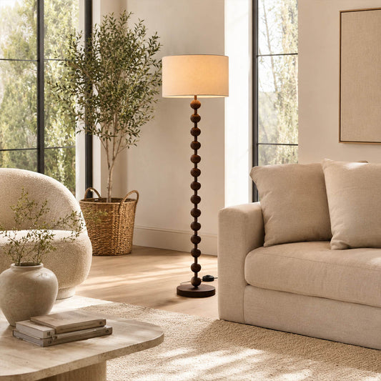 Tronco floor lamp walnut wood modern living room corner sofa side accent tall 63 inch statement natural wood white fabric shade Japandi Scandinavian warm ambient sophisticated lifestyle interior American home
