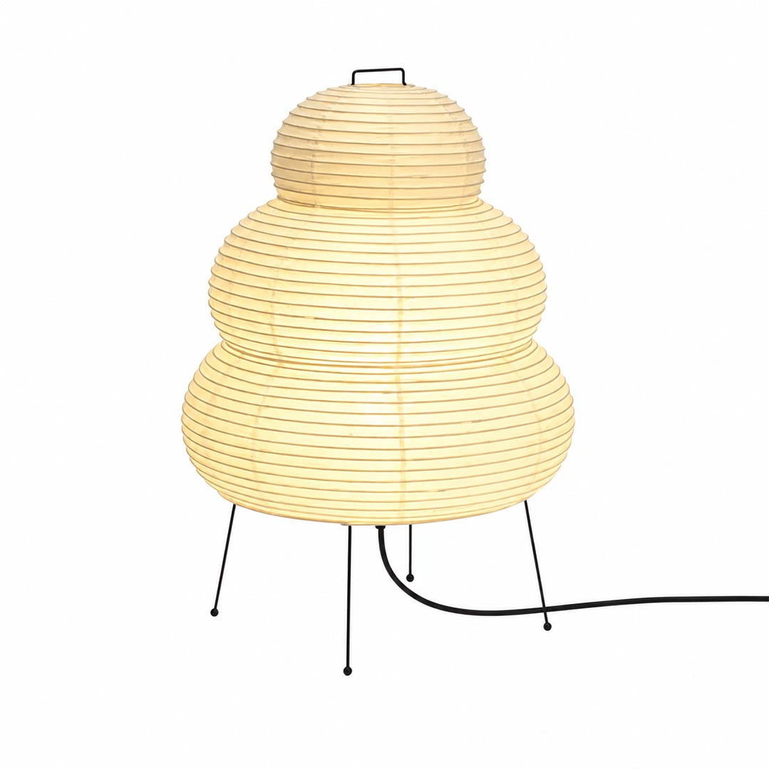 Studio portrait of the illuminated 3-tier snowman-shaped Washi Paper 25N Table Lamp against a clean white backdrop by Stuber Lighting.