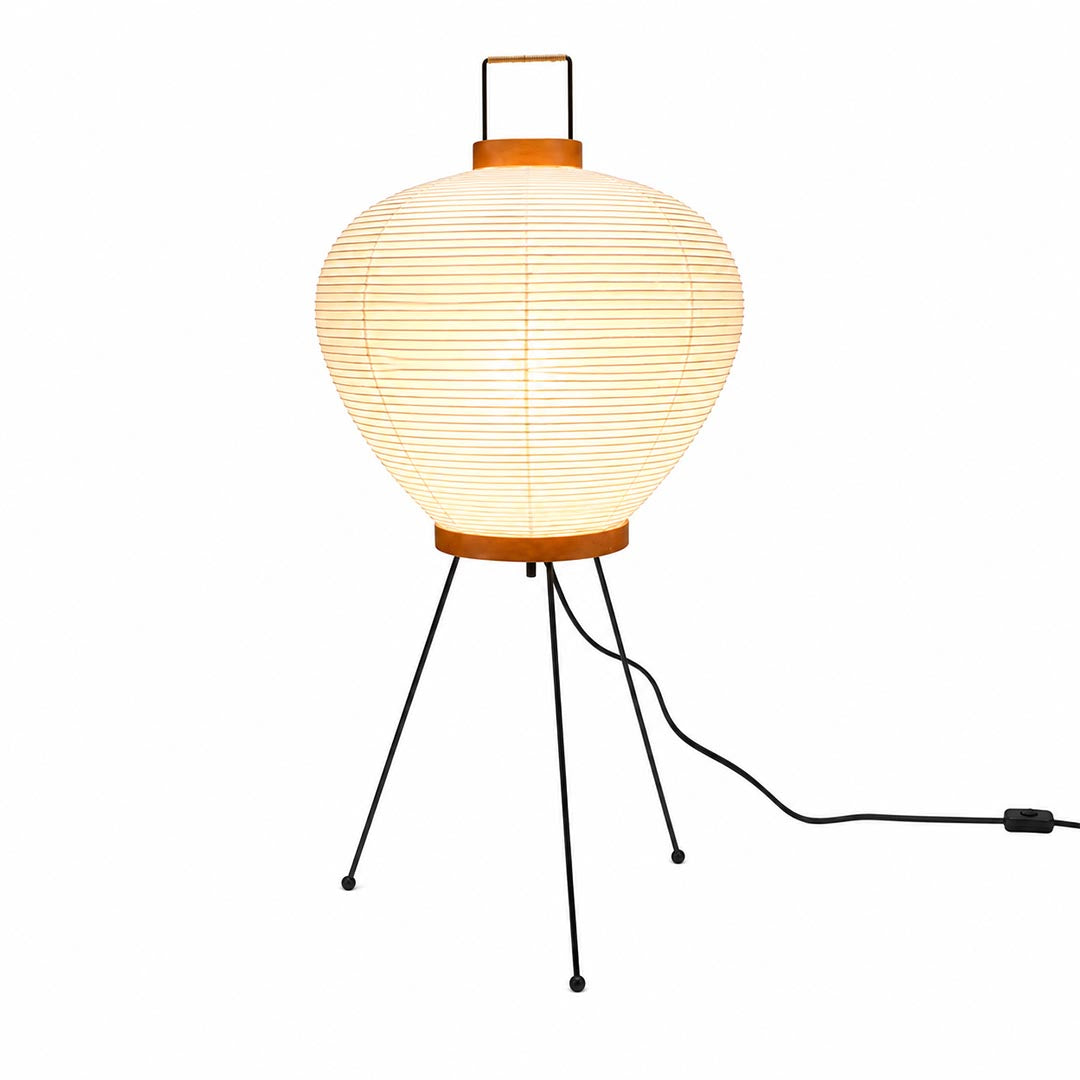 Studio portrait of the illuminated Washi Paper 3A Table Lamp with a top handle against a solid white backdrop by Stuber Lighting.