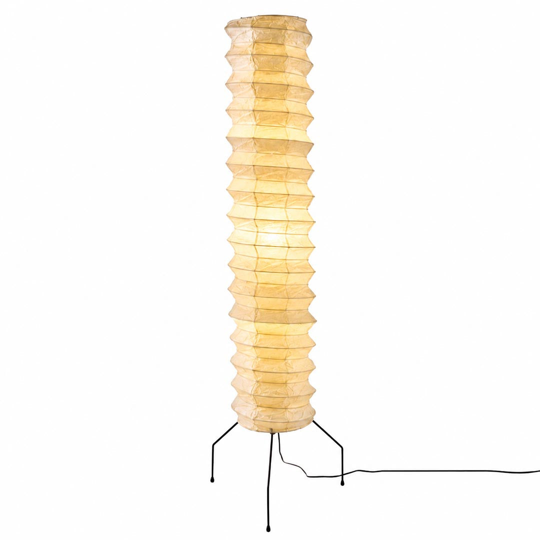 Studio portrait of an illuminated tall Washi Paper UF4-31N Floor Lamp with a glowing warm amber shade by Stuber Lighting.