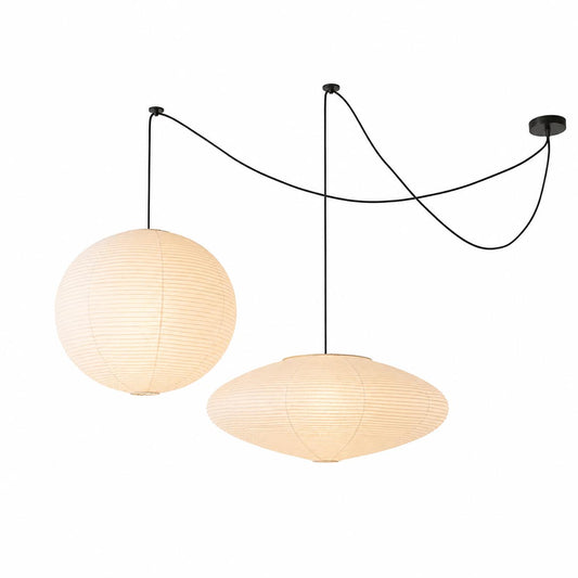 Studio portrait of the warmly illuminated Washi Paper Whimsy 2-Light Pendant fixture against a white backdrop by Stuber Lighting.