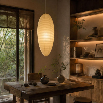 Illuminated 23A 24A washi paper egg shape pendant light creating warm ambient lighting in a Japandi tea room setup