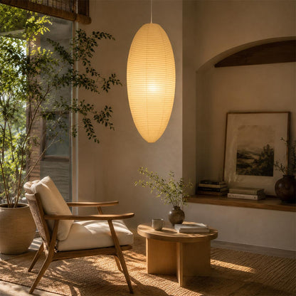 Warmly lit 23A 24A washi paper egg shape pendant light hanging in a cozy living room lounge corner