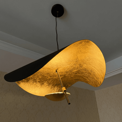 Giorgio pendant light applied gold leaf interior texture warm light reflection