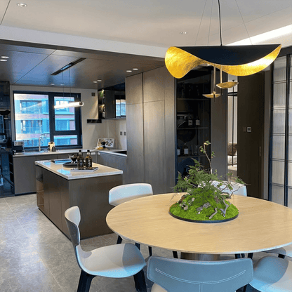 Giorgio pendant light applied gold leaf interior texture warm light reflection