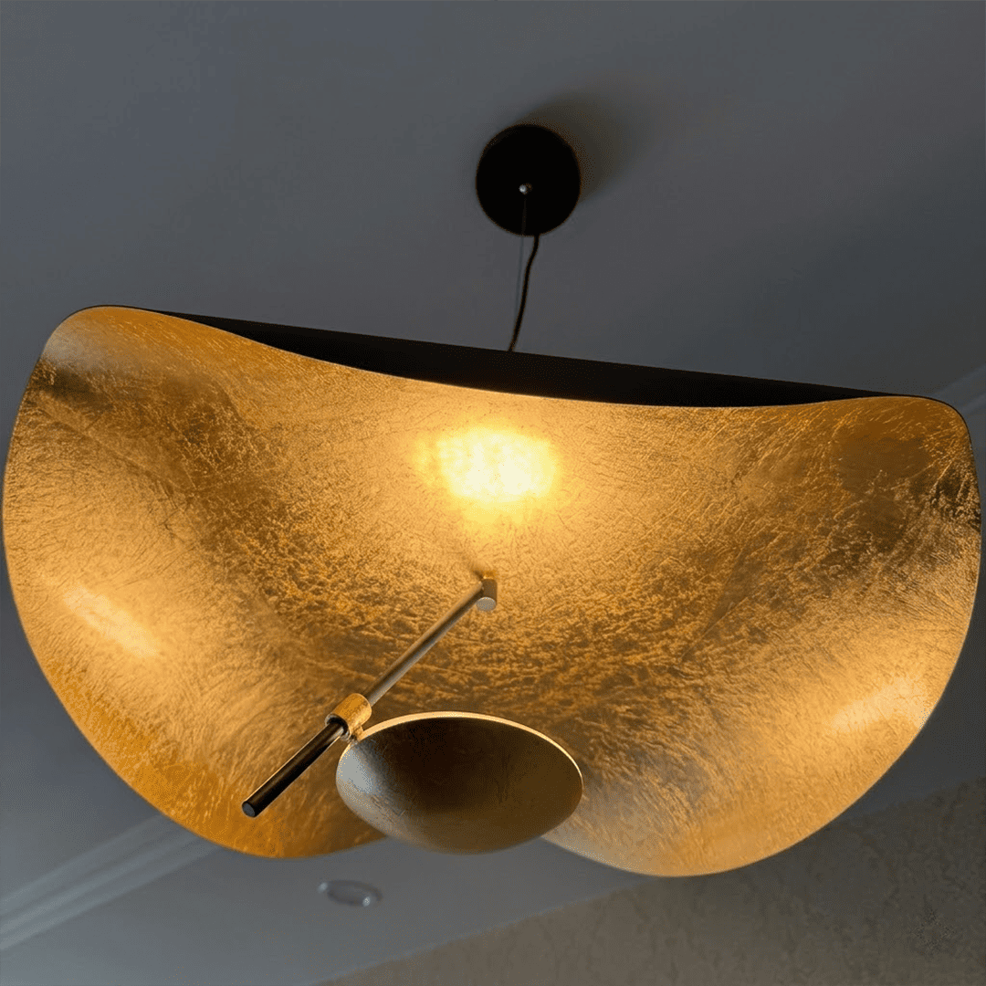 Giorgio pendant light applied gold leaf interior texture warm light reflection