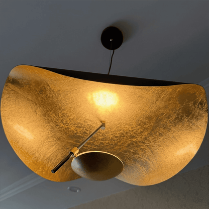 Giorgio pendant light applied gold leaf interior texture warm light reflection