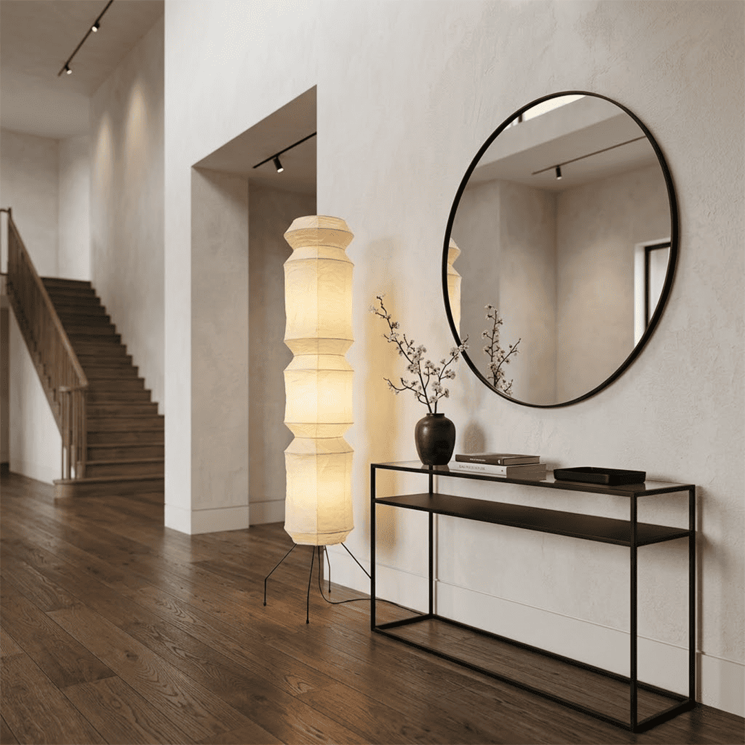 Minimalist modern home lamp: A sculptural Japanese-style multi-tiered paper floor lamp with a columnar design, providing warm interior decoration lighting for a cozy atmosphere.
