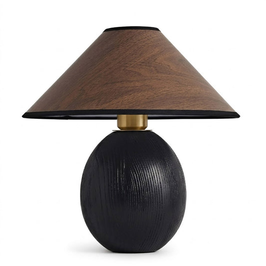 Penna wood table lamp switched on warm light glow bedside nightstand