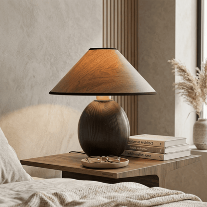 Penna wood table lamp switched on warm light glow bedside nightstand