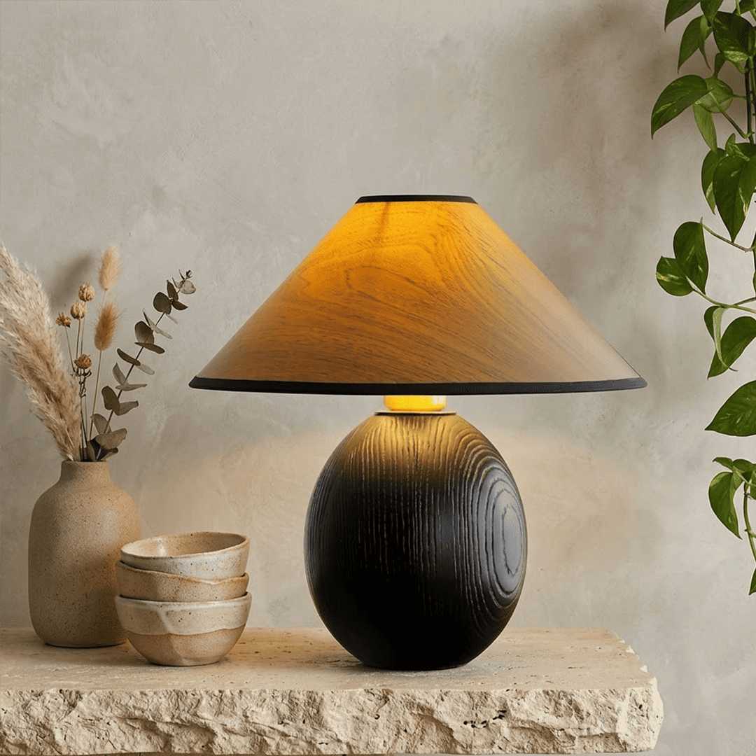 Penna wood table lamp switched on warm light glow bedside nightstand