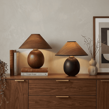 Penna wood table lamp switched on warm light glow bedside nightstand