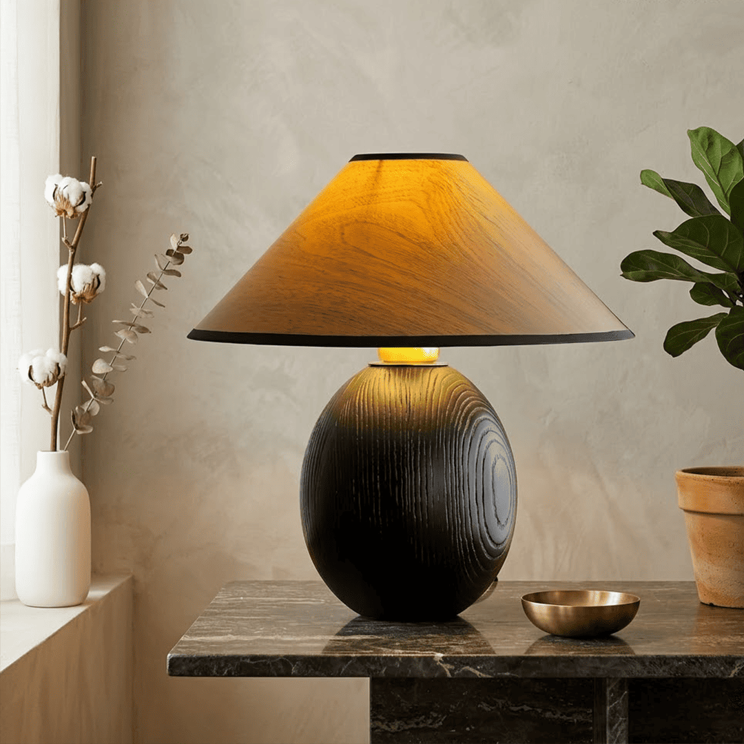 Penna wood table lamp switched on warm light glow bedside nightstand