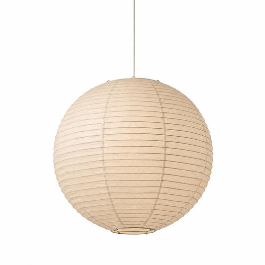 Large Washi paper sphere pendant light hanging in a minimalist Japandi style bedroom with warm light.