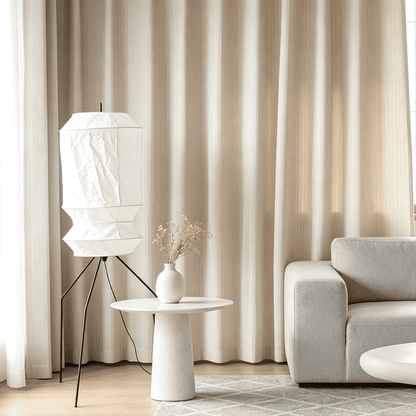 Stuberlighting UF3-L6 handmade Washi paper floor lamp with three-legged metal stand in a minimalist Japandi living room.