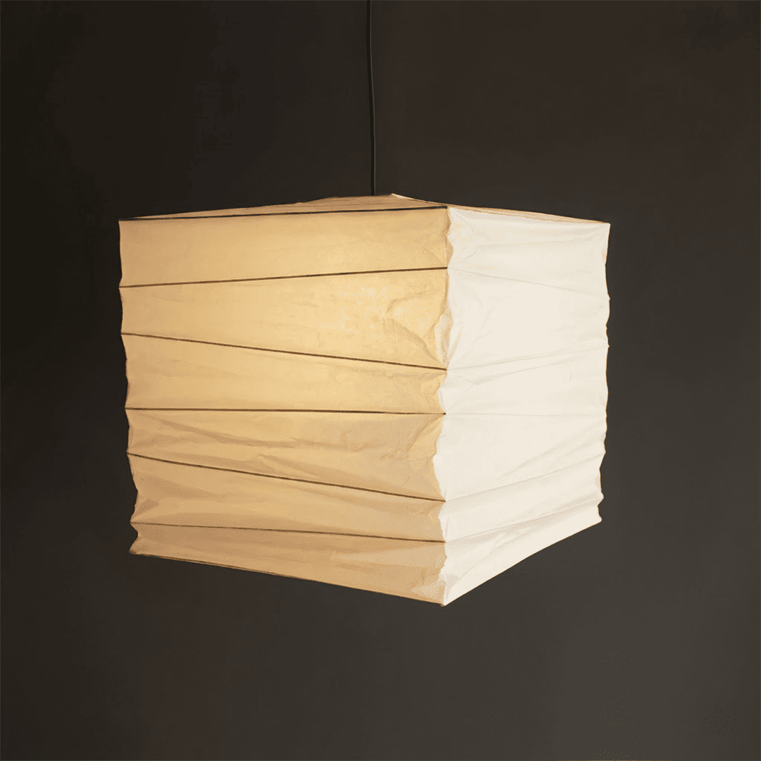 Modern Japanese-style square washi paper pendant light with fine horizontal pleated texture, emitting warm ambient glow through translucent paper for dining room, bedroom, and study.