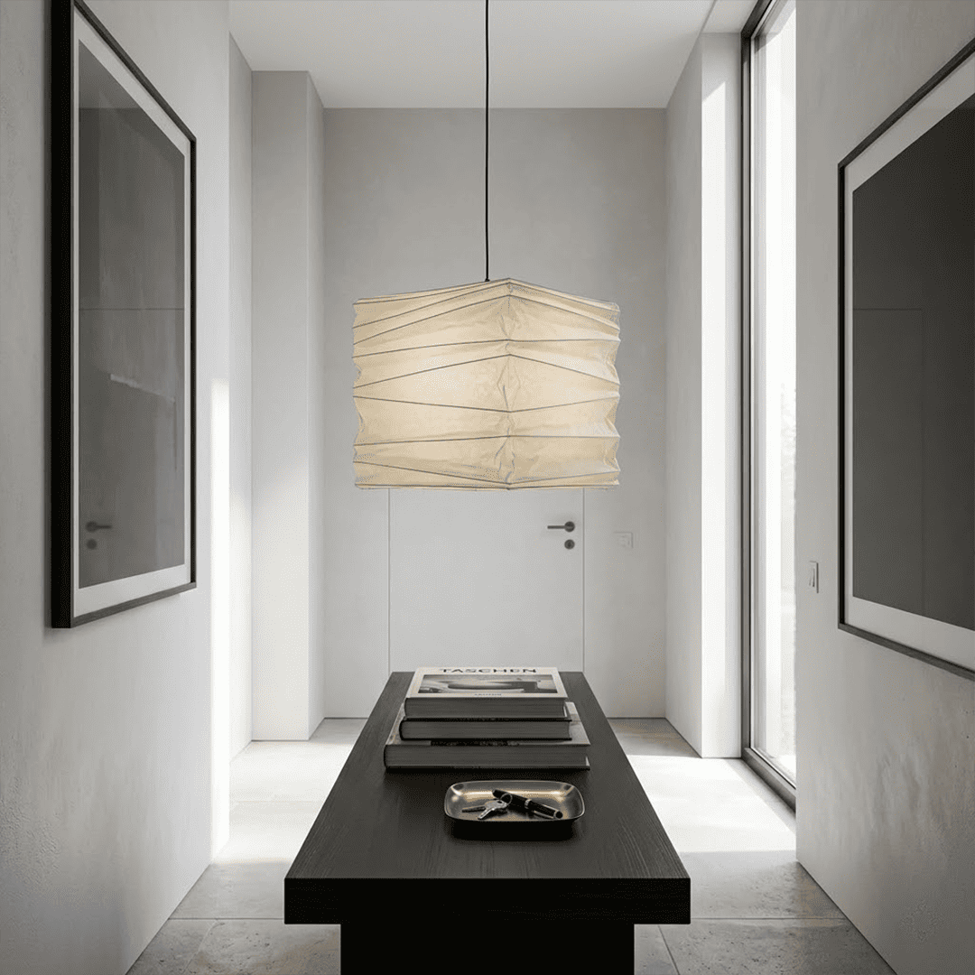 A handcrafted, square Washi paper pendant lamp (Model 33X)—suspended within a room—exudes an innate artistic flair, showcasing the distinctive texture and grain of mulberry bark paper.