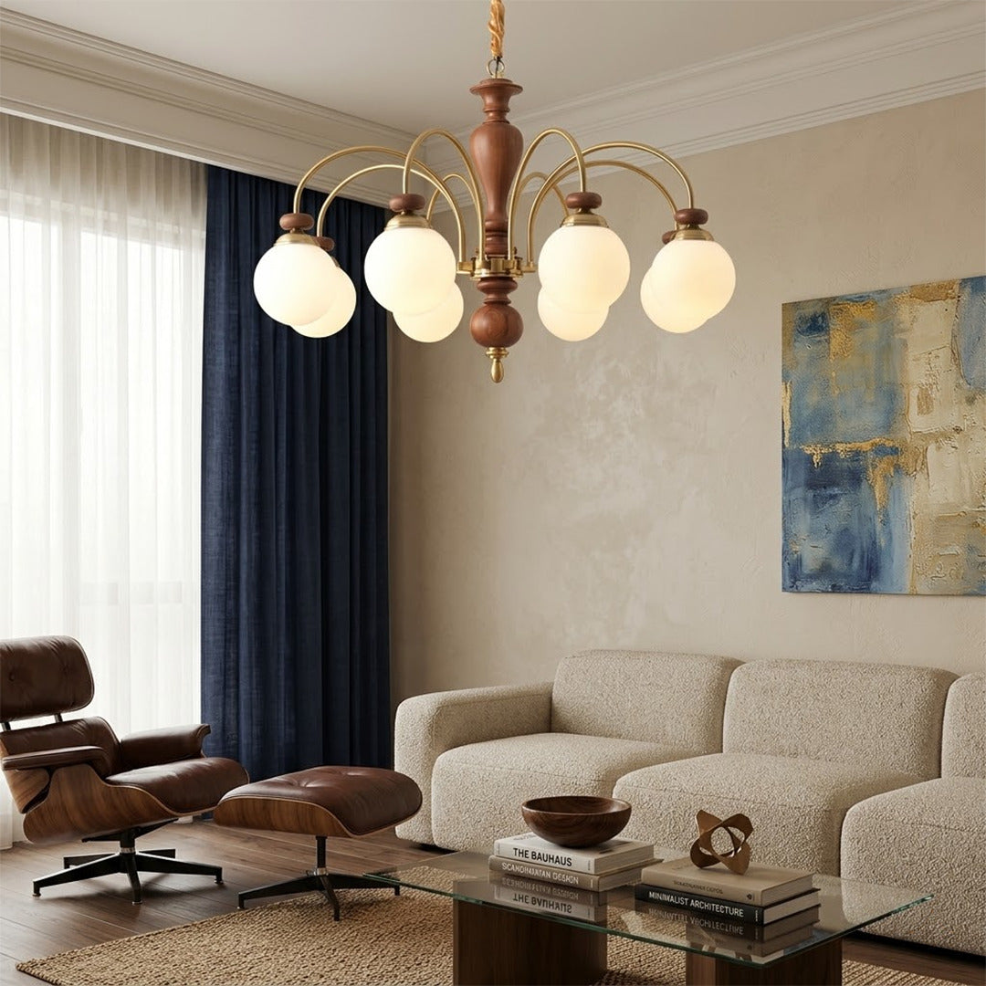 Windsor walnut chandelier  above dining table warm glowing light living room