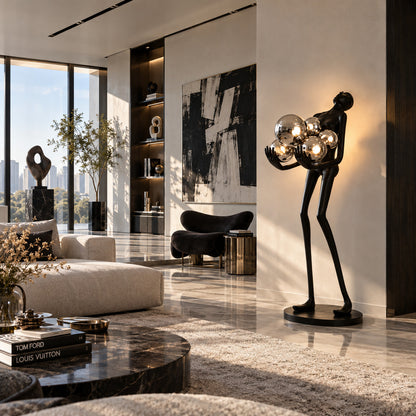 Abbraccio glass floor lamp filling a living room corner with a warm cluster of glowing globes