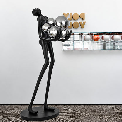 Abbraccio glass floor lamp filling a living room corner with a warm cluster of glowing globes