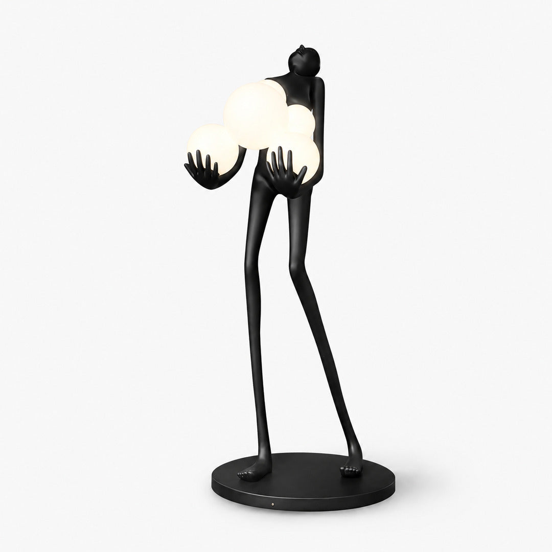Small 63-inch Abbraccio glass floor lamp with white glass globes beside a living room sofa