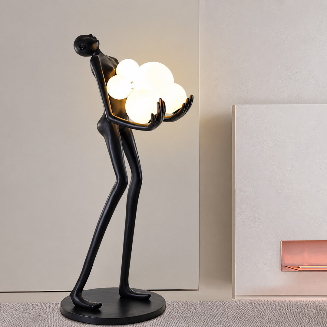 Abbraccio glass floor lamp filling a living room corner with a warm cluster of glowing globes
