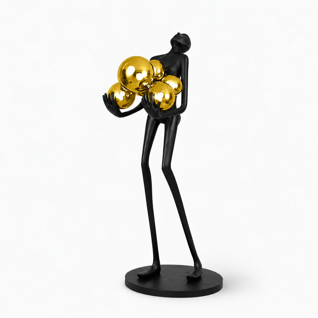 Small 63-inch Abbraccio glass floor lamp with gold glass globes as a warm luxe accent