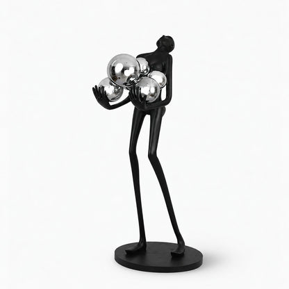 Small 63-inch Abbraccio glass floor lamp with silver glass globes in a contemporary space