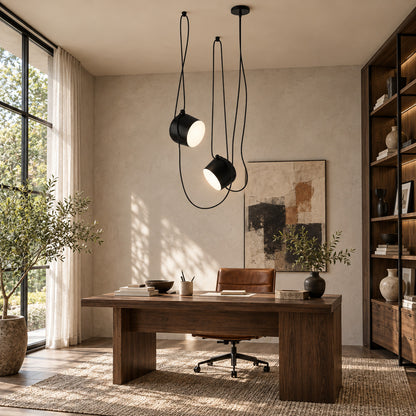 Aim pendant light aimed to provide focused task light over a home office desk