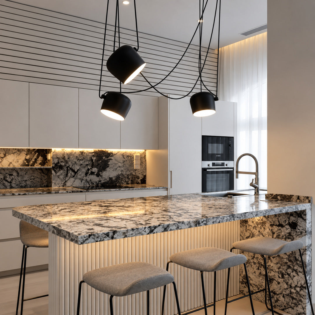 Aim adjustable pendant lights aimed over a modern kitchen island