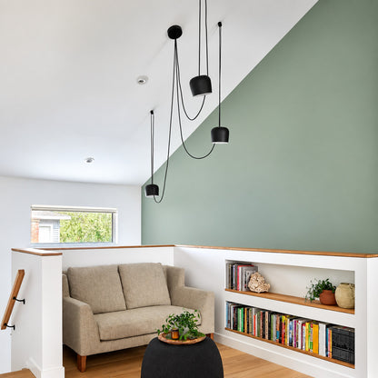 Aim pendant light aimed to provide focused task light over a home office desk