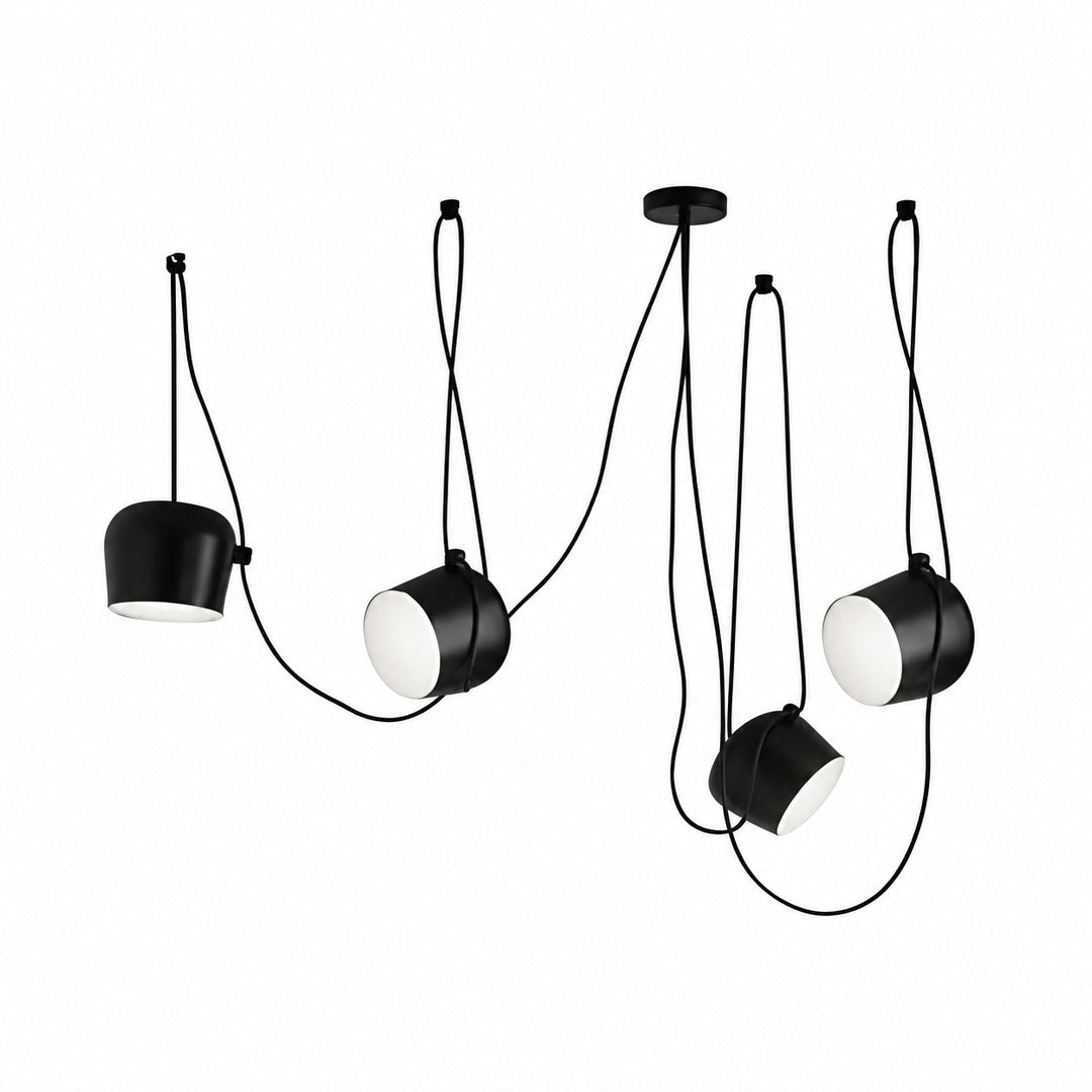 Four-head black Aim pendant light over a large kitchen island
