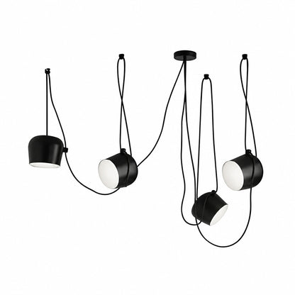 Four-head black Aim pendant light over a large kitchen island